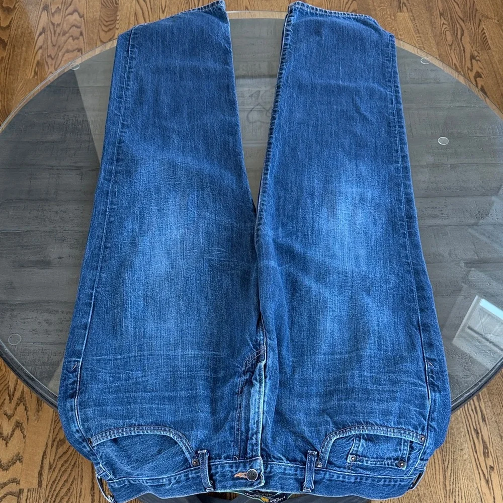 Lucky Brand Men's 363 Vintage Straight Jeans. Size 40 x 32. Distressed back hem